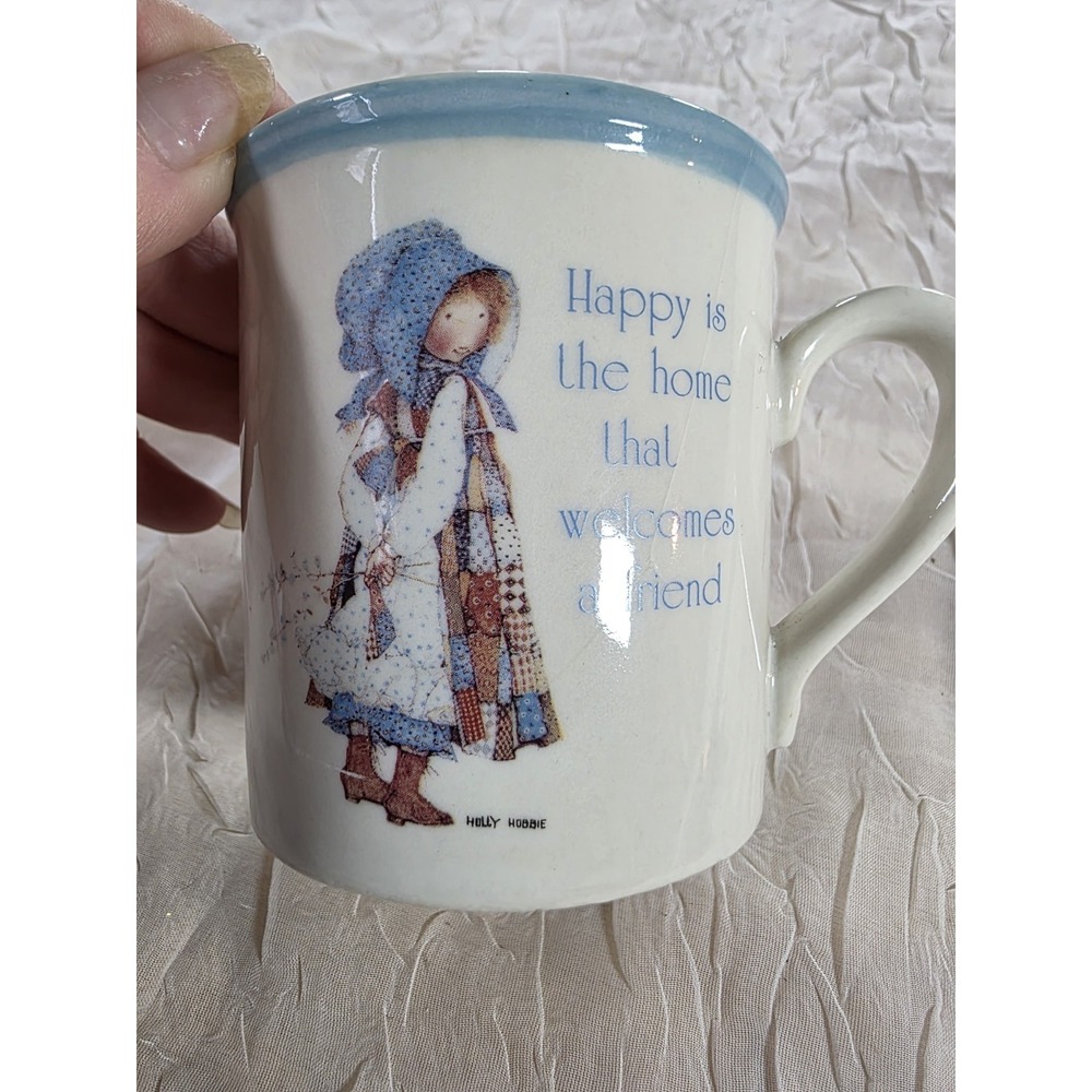 HOLLY HOBBIE STONEWARE BLUE GIRL CHILD'S MUG 9 OZ BLUE TRIM HAPPY IS THE HOME